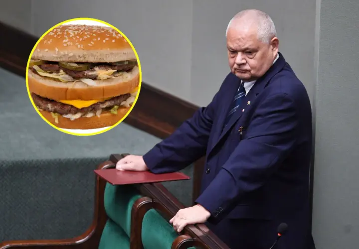 Polityk w garniturze pochyla się nad mównicą, obok widoczny Big Mac. Czy to symbol jego myśli o big mac cena?