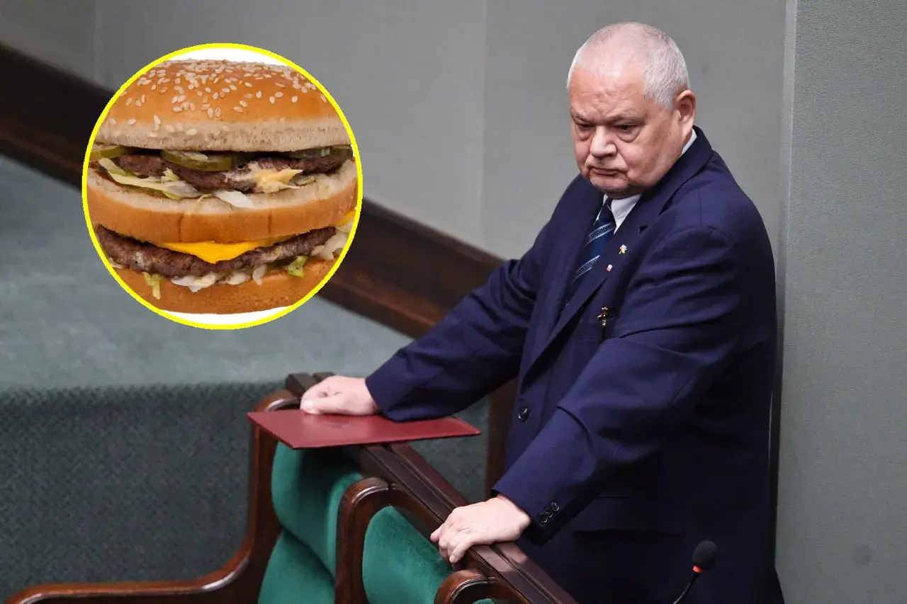 Polityk w garniturze pochyla się nad mównicą, obok widoczny Big Mac. Czy to symbol jego myśli o big mac cena?